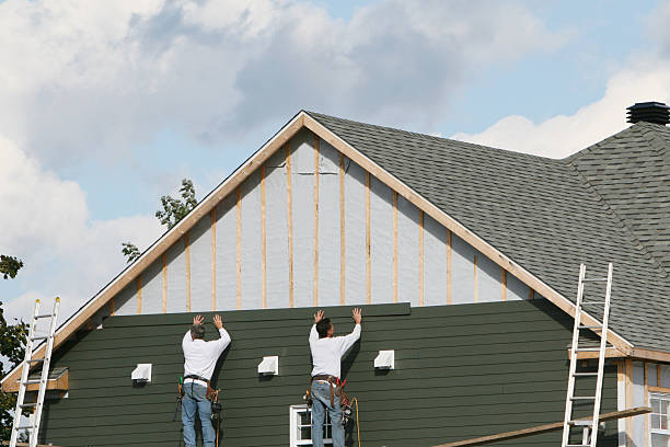 Professional Siding Contractor technician working in Winfield, TN